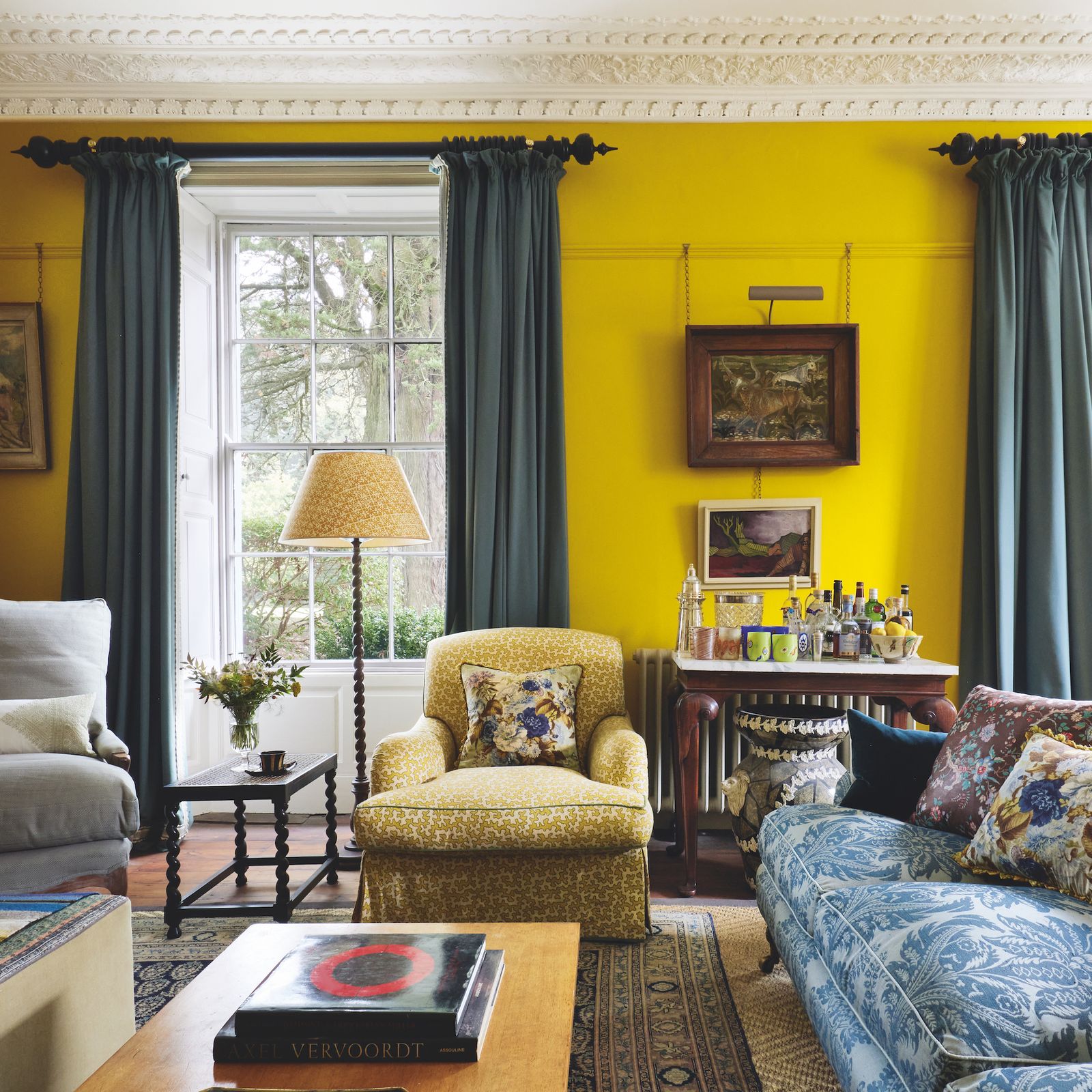 Image may contain Home Decor Architecture Building Furniture Indoors Living Room Room Book Publication and Couch