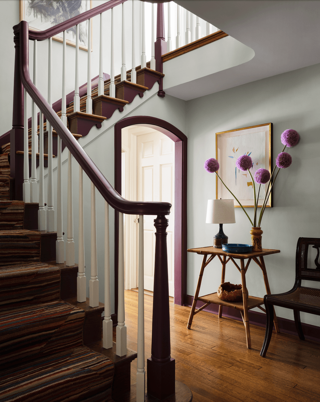 Image may contain Architecture Building House Housing Staircase Indoors Interior Design Foyer Chair and Furniture