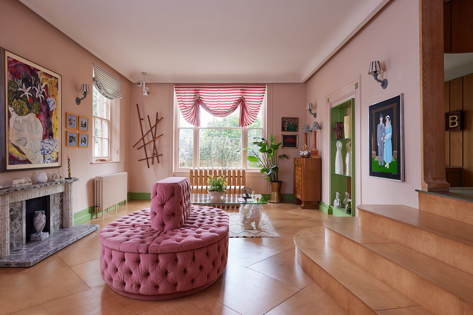 Image may contain Lamp Home Decor Plant Furniture Art Painting Floor Flooring Architecture Building and Indoors