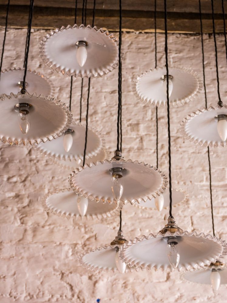 Image may contain: Chandelier, and Lamp