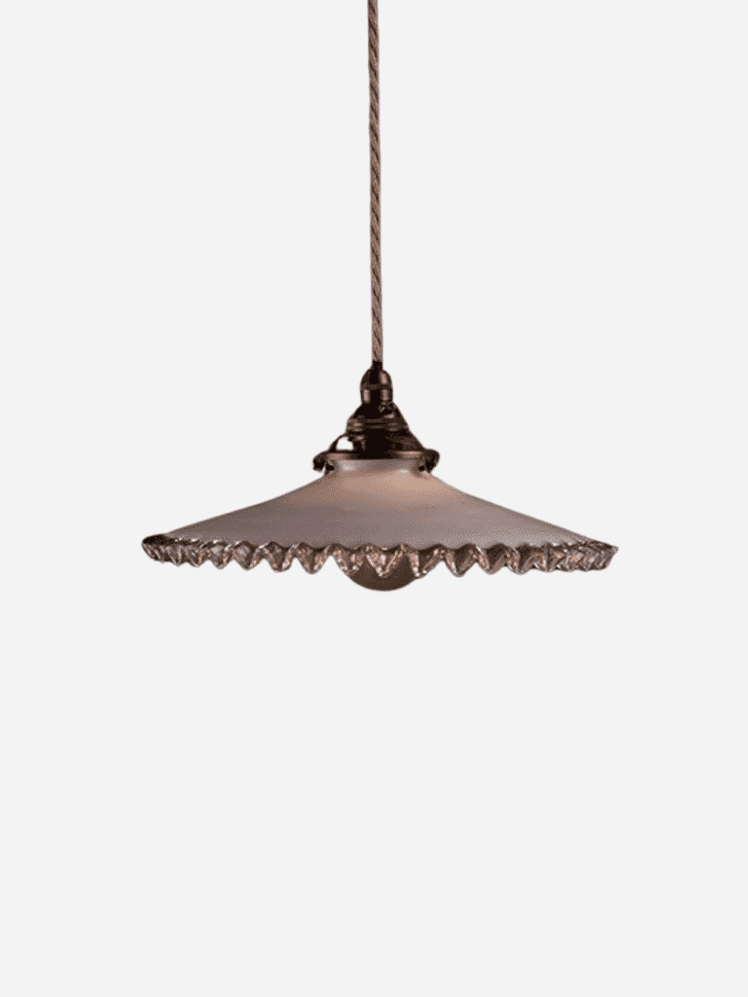 Image may contain: Light Fixture, Lamp, Chandelier, and Ceiling Light