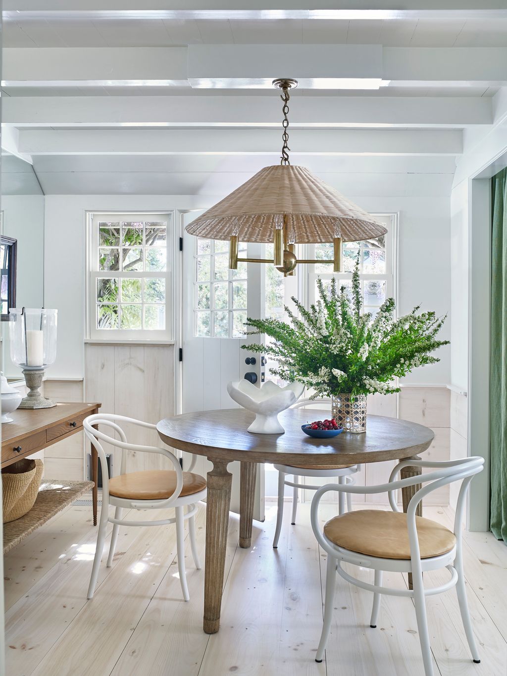 Image may contain Architecture Building Dining Room Dining Table Furniture Indoors Room Table Lamp Chair and Desk