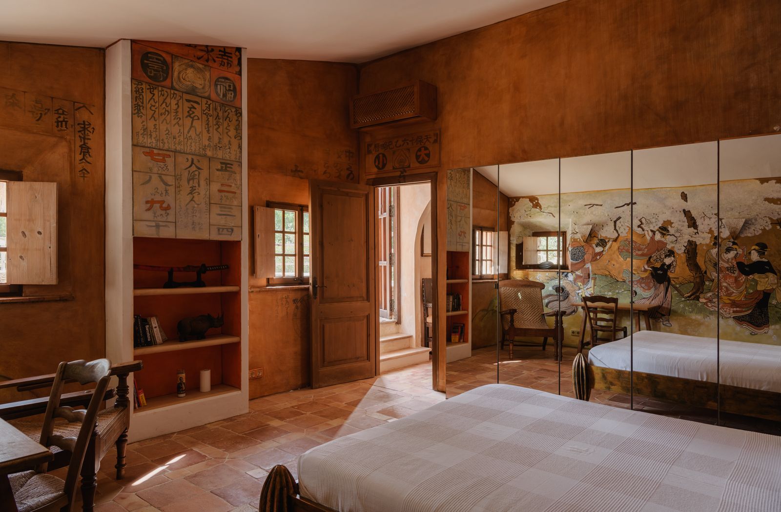 Image may contain Chair Furniture Indoors Interior Design Wood Bed Home Decor Person Bedroom Room and Architecture