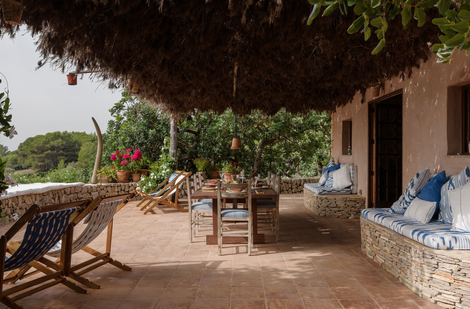 Image may contain Architecture Building Hotel Resort House Housing Villa Chair Furniture Patio Path and Walkway