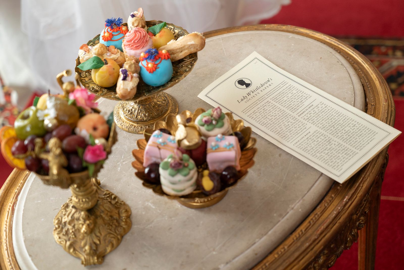 Image may contain People Person Cream Dessert Food Icing Furniture Table Tabletop and Text