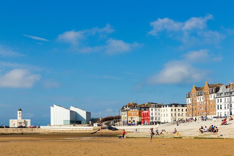 Image may contain: City, Water, Waterfront, Nature, Outdoors, Scenery, Architecture, Building, Cityscape, and Urban