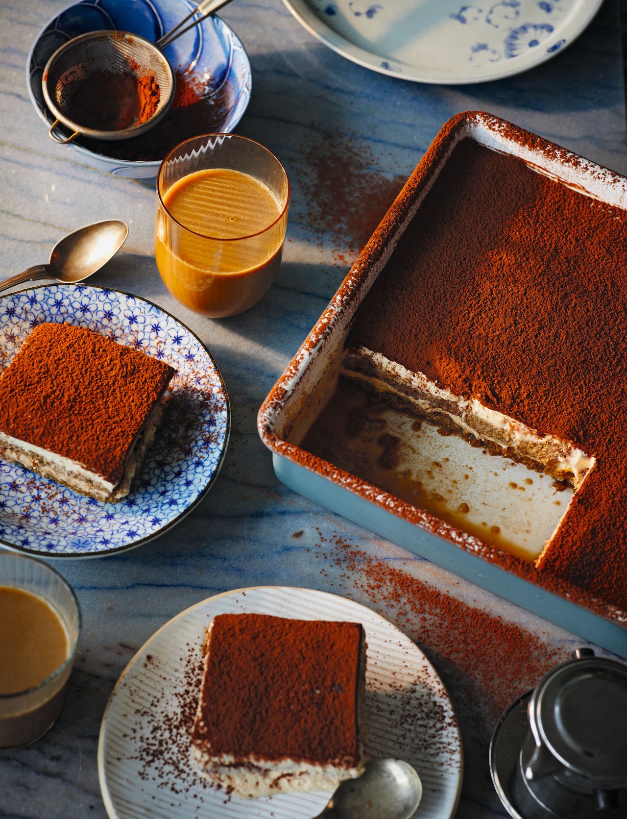Image may contain Cutlery Spoon Dessert Food Plate Cup Tiramisu and Bread
