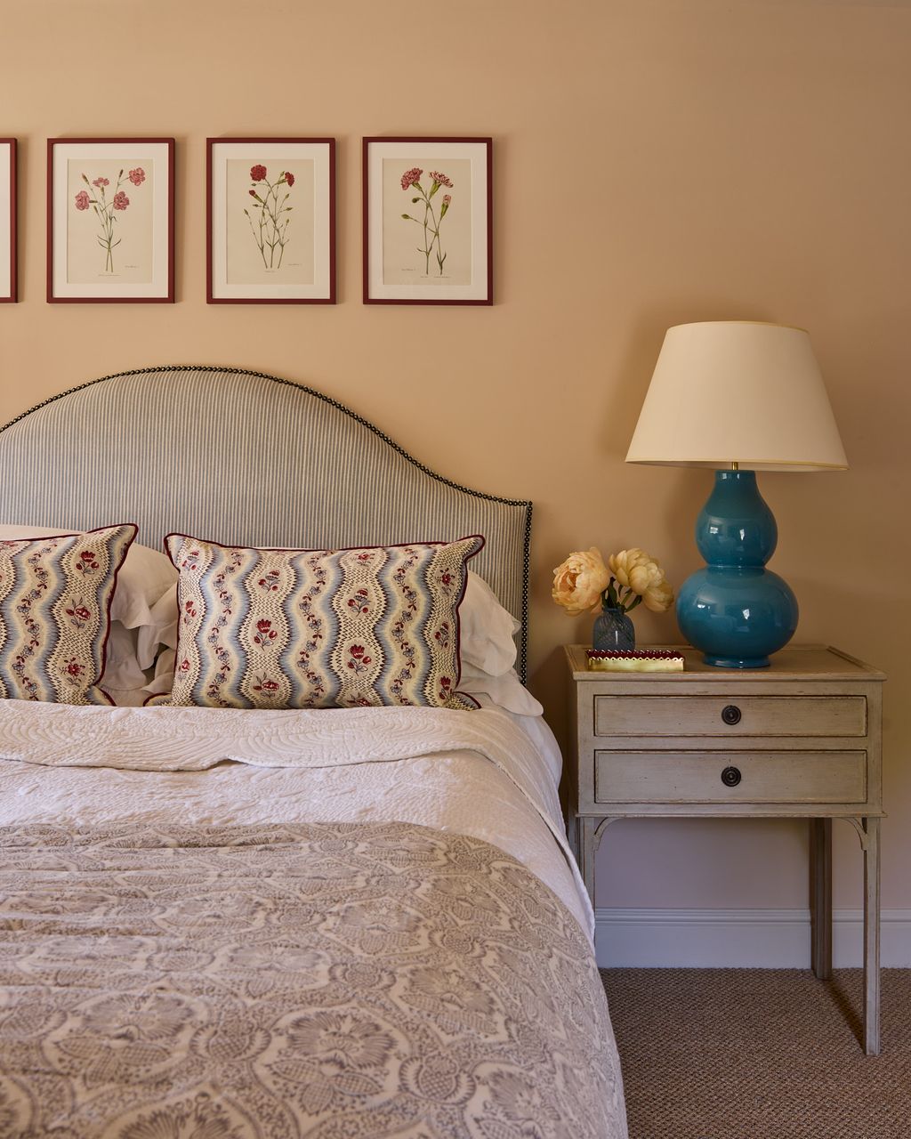 Image may contain Lamp Cushion Home Decor Bed Furniture Table Lamp Art Painting Pillow Book and Publication