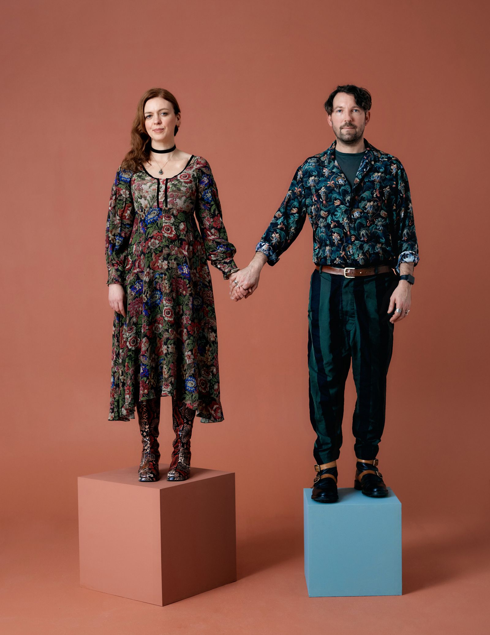 Image may contain Adult Person Clothing Long Sleeve Sleeve Body Part Hand Accessories Jewelry Necklace and Dress