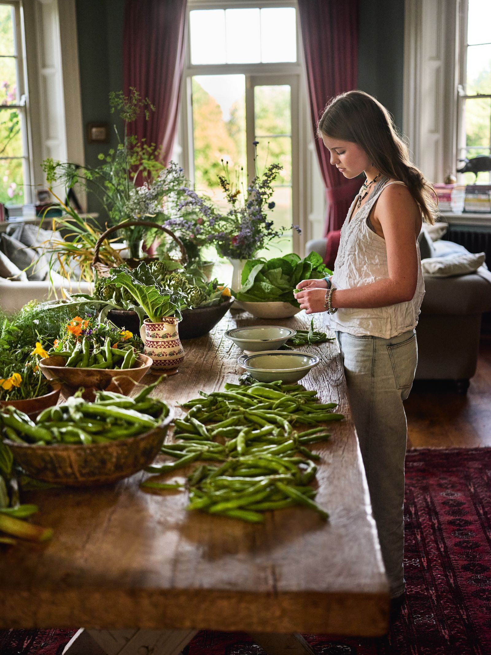 Image may contain Person Teen Furniture Table Accessories Jewelry Necklace and Couch