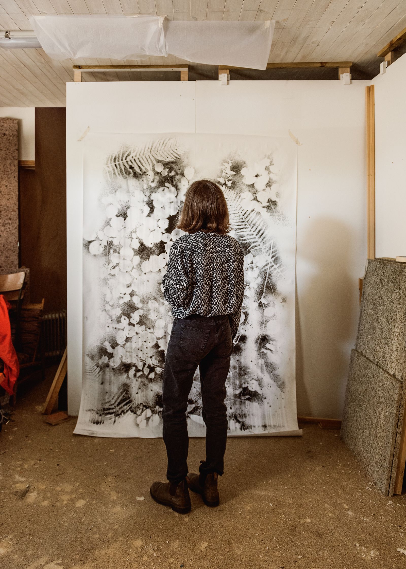 Image may contain Clothing Pants Person Standing Footwear Shoe Indoors Interior Design Art Chair and Furniture