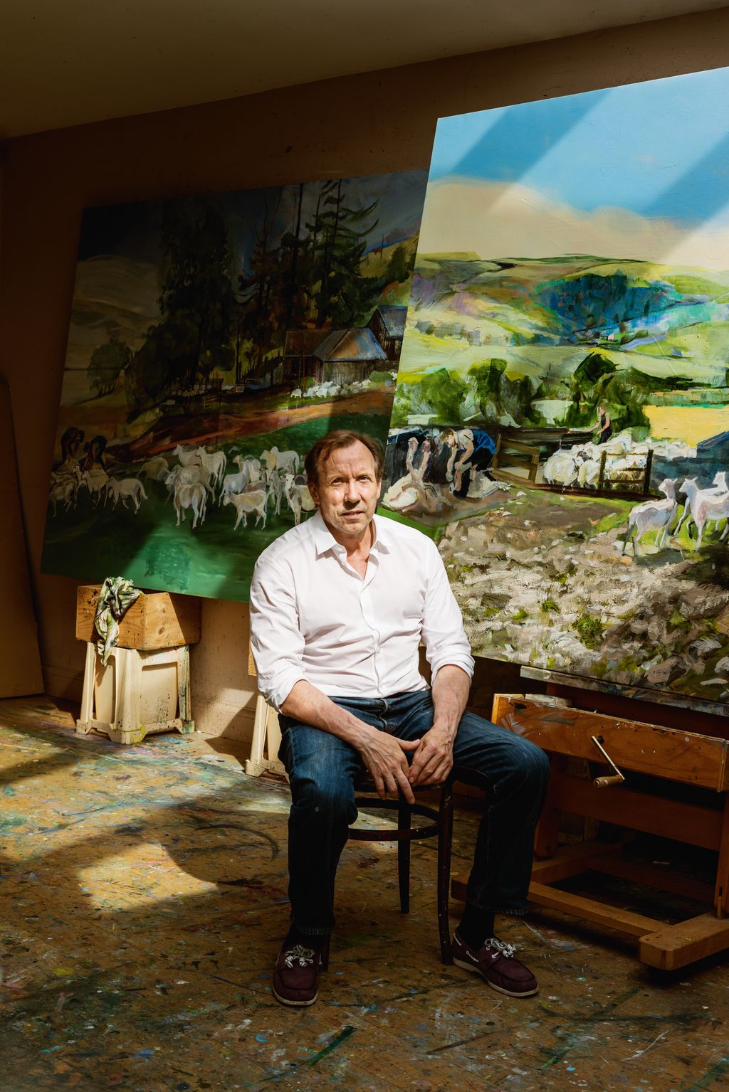 Image may contain Face Head Person Photography Portrait Clothing Pants Sitting Plant Potted Plant and Footwear