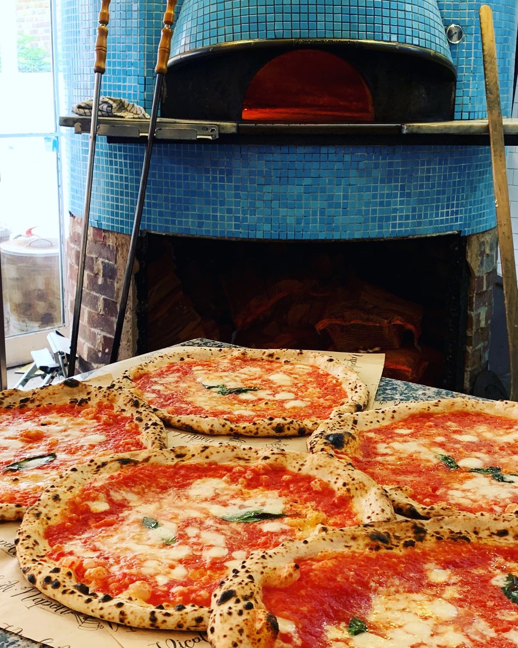 Image may contain Food Pizza Appliance Baking Cooking Device Electrical Device and Oven