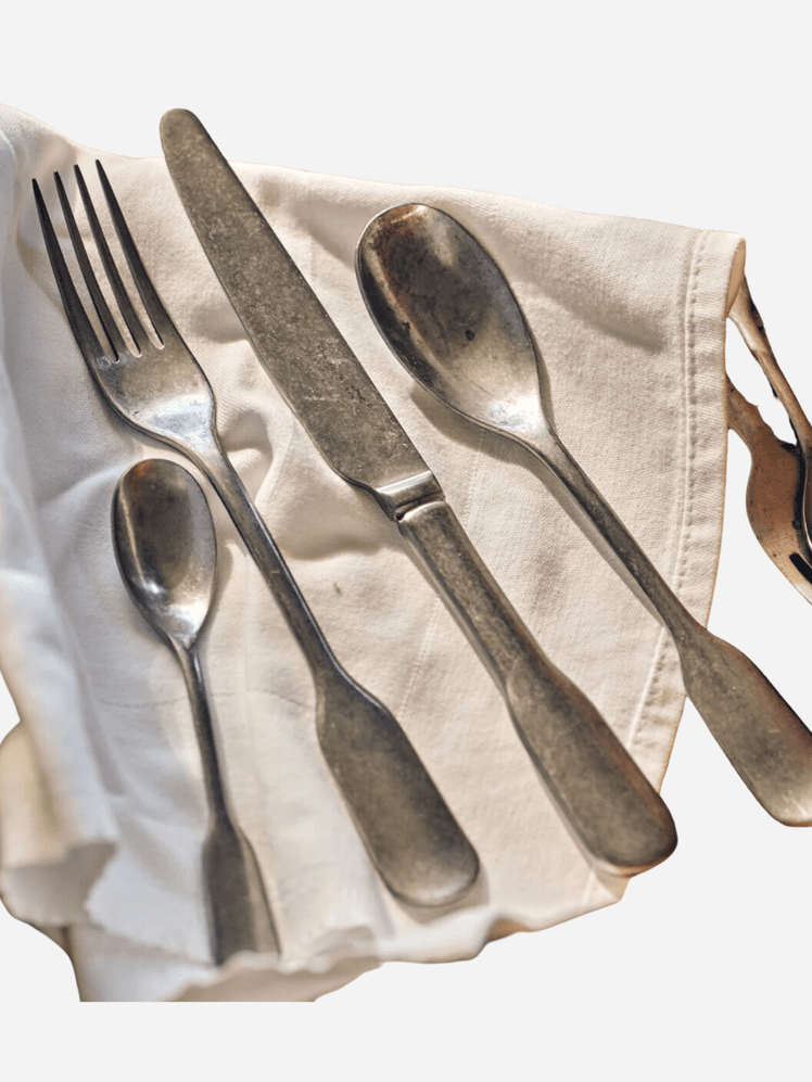 Image may contain: Cutlery, Fork, Spoon, and Napkin