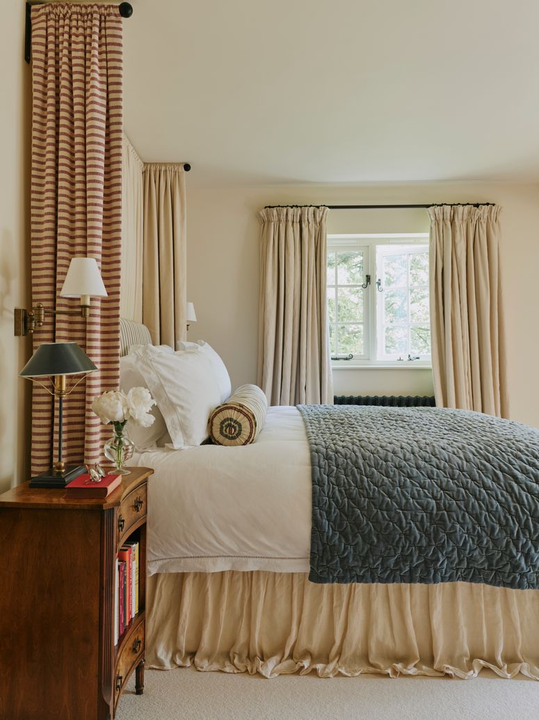 Image may contain: Lamp, Indoors, Interior Design, Bed, Furniture, Table Lamp, Bedroom, Room, and Home Decor