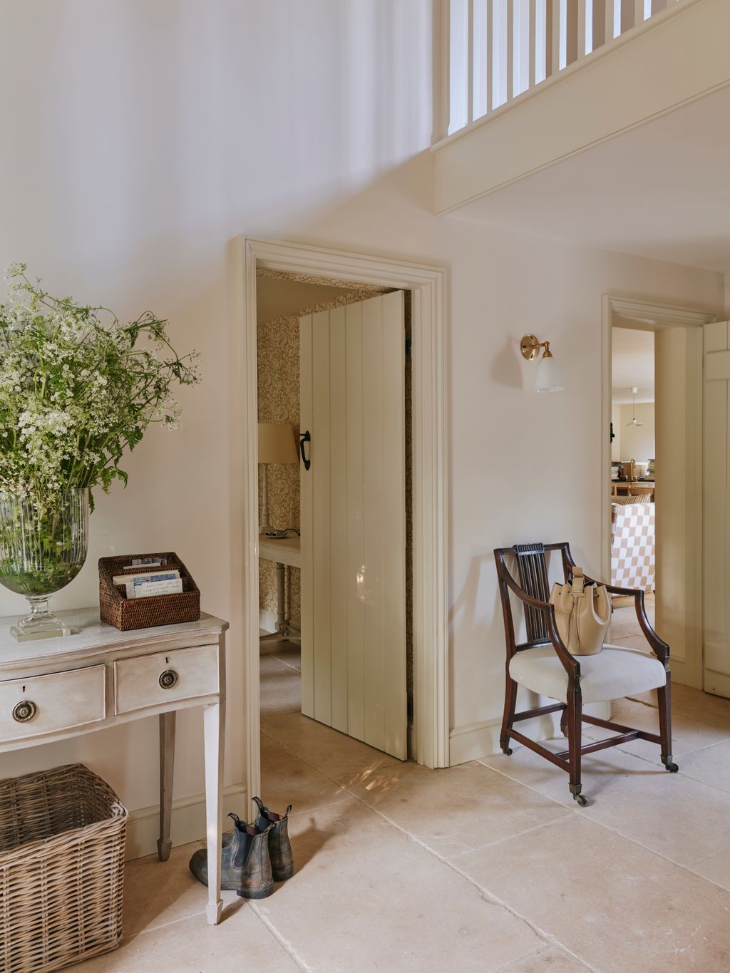 Image may contain Indoors Interior Design Floor Chair Furniture Accessories Bag Handbag Lamp and Architecture