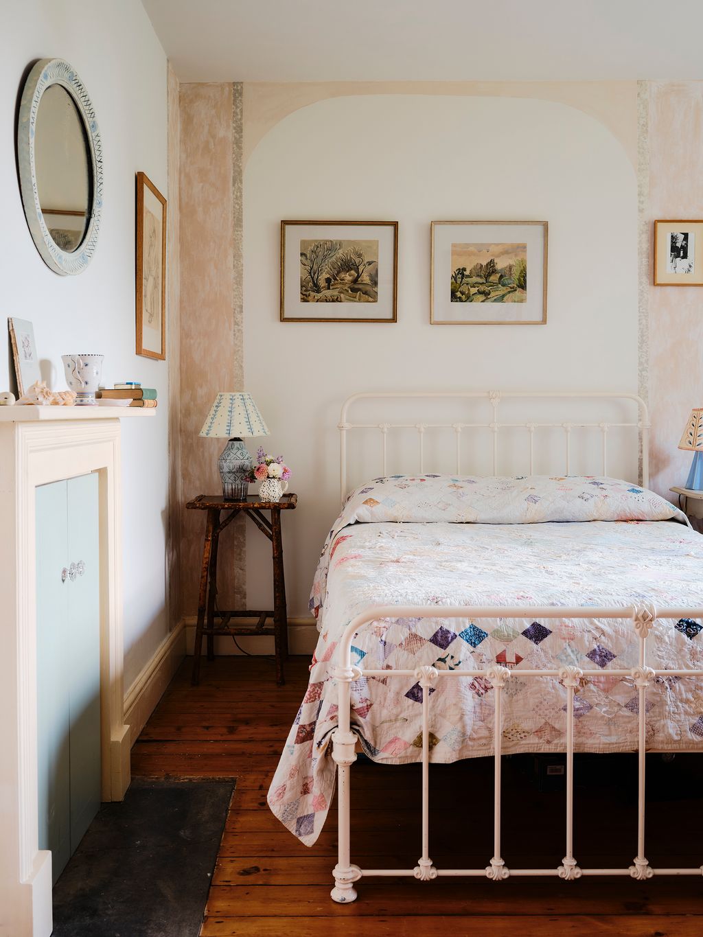 Image may contain Indoors Interior Design Lamp Bed Furniture Art Painting Home Decor Floor Bedroom Room and Rug