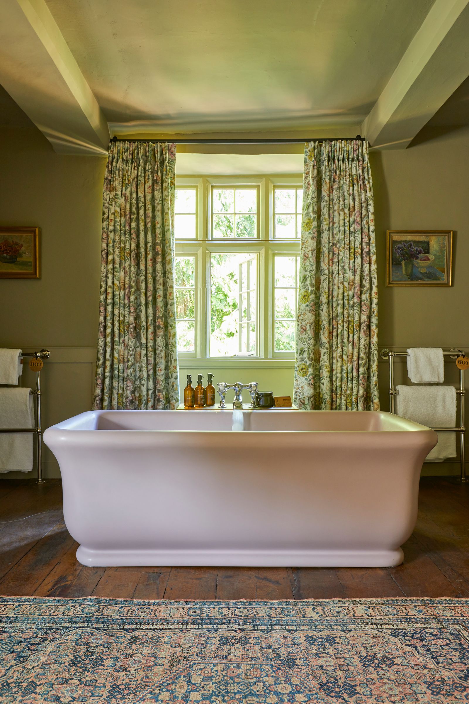 Image may contain Bathing Bathtub Person Tub Art Painting Home Decor Rug Indoors Interior Design and Sink