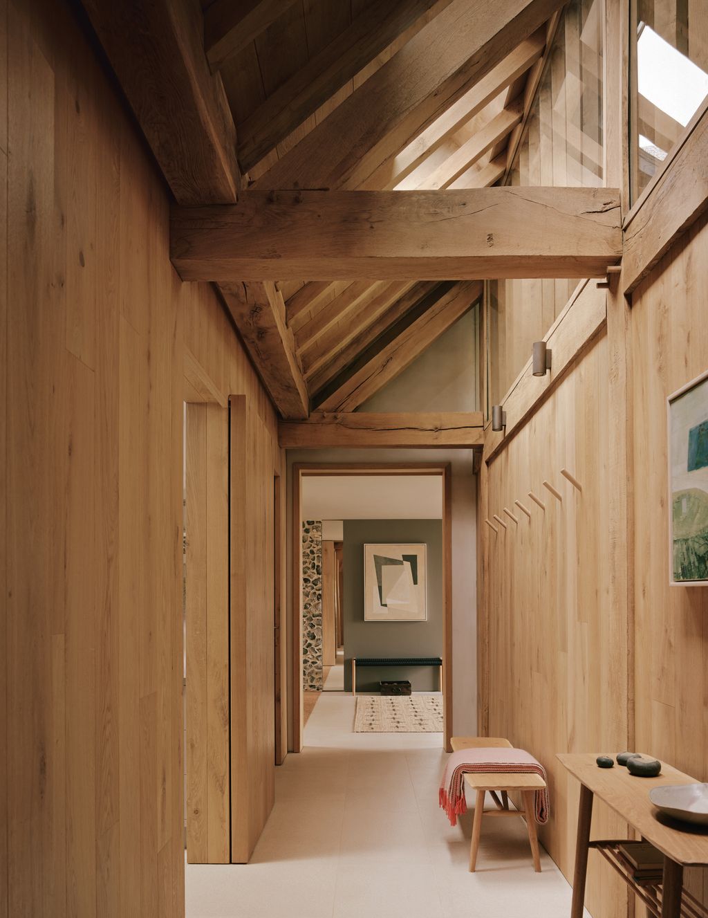 Image may contain Indoors Interior Design Wood Plywood Hardwood Home Decor Rug Stained Wood and Wood Panels