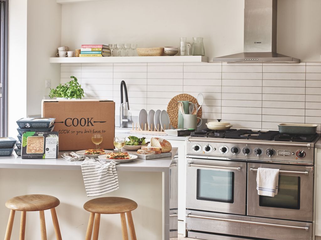 Image may contain Indoors Interior Design Kitchen Bread Food Box Plate Cooktop Furniture and Cup