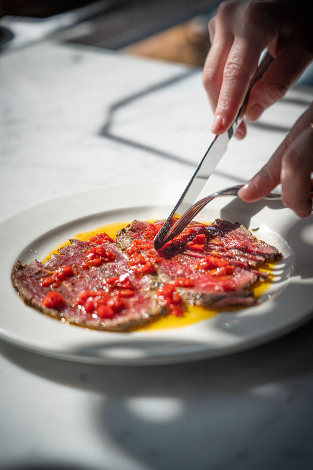 Image may contain Food Food Presentation Plate Blade Knife Weapon Baby and Person