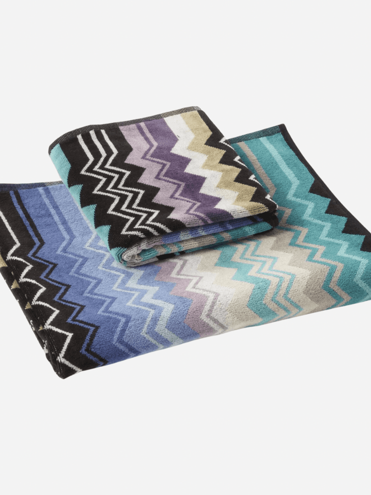 Image may contain: Home Decor, Rug, Accessories, Wallet, Cushion, Bag, and Handbag