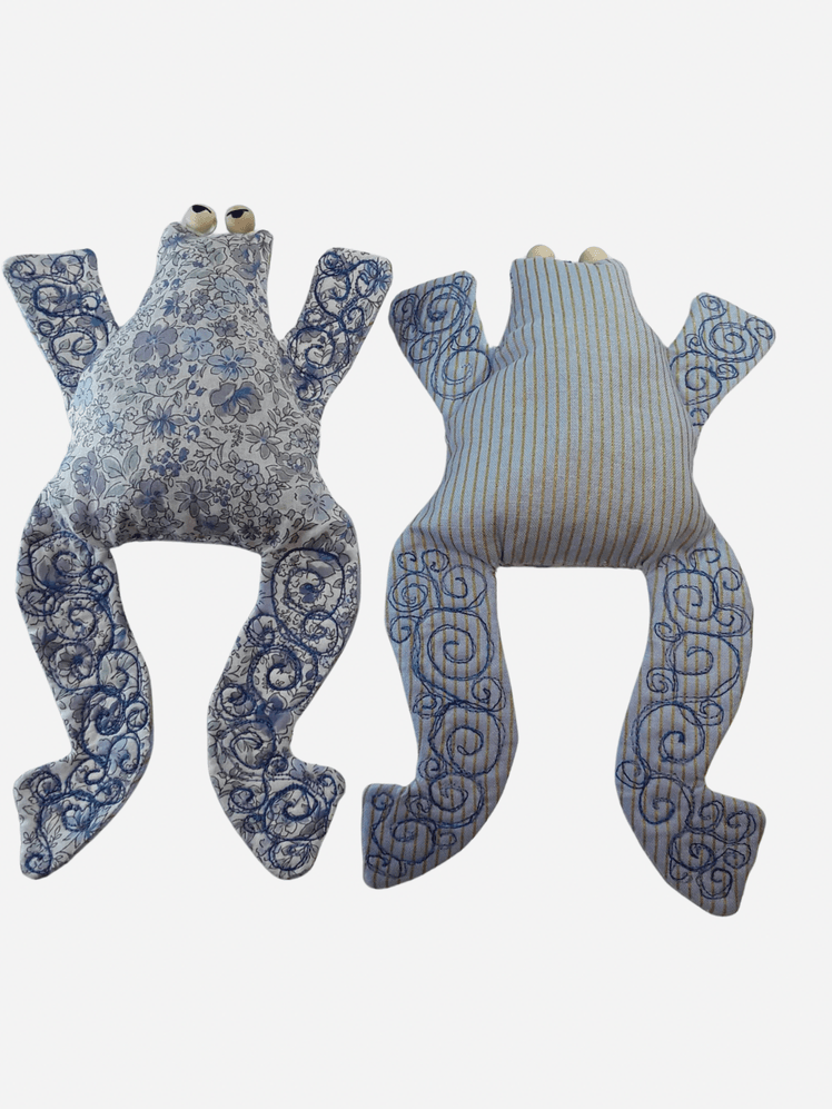 Image may contain: Cushion, Home Decor, Clothing, Vest, Pattern, and Glove