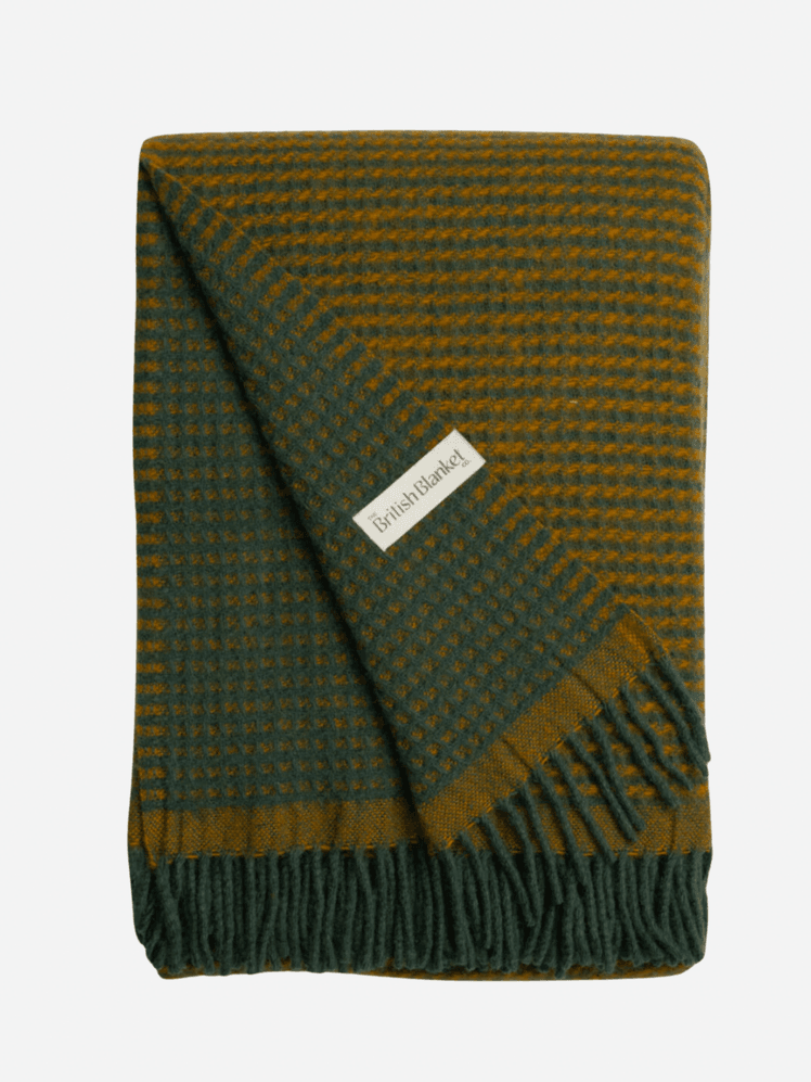 Image may contain: Blanket, Home Decor, Accessories, Bag, Handbag, and Woven