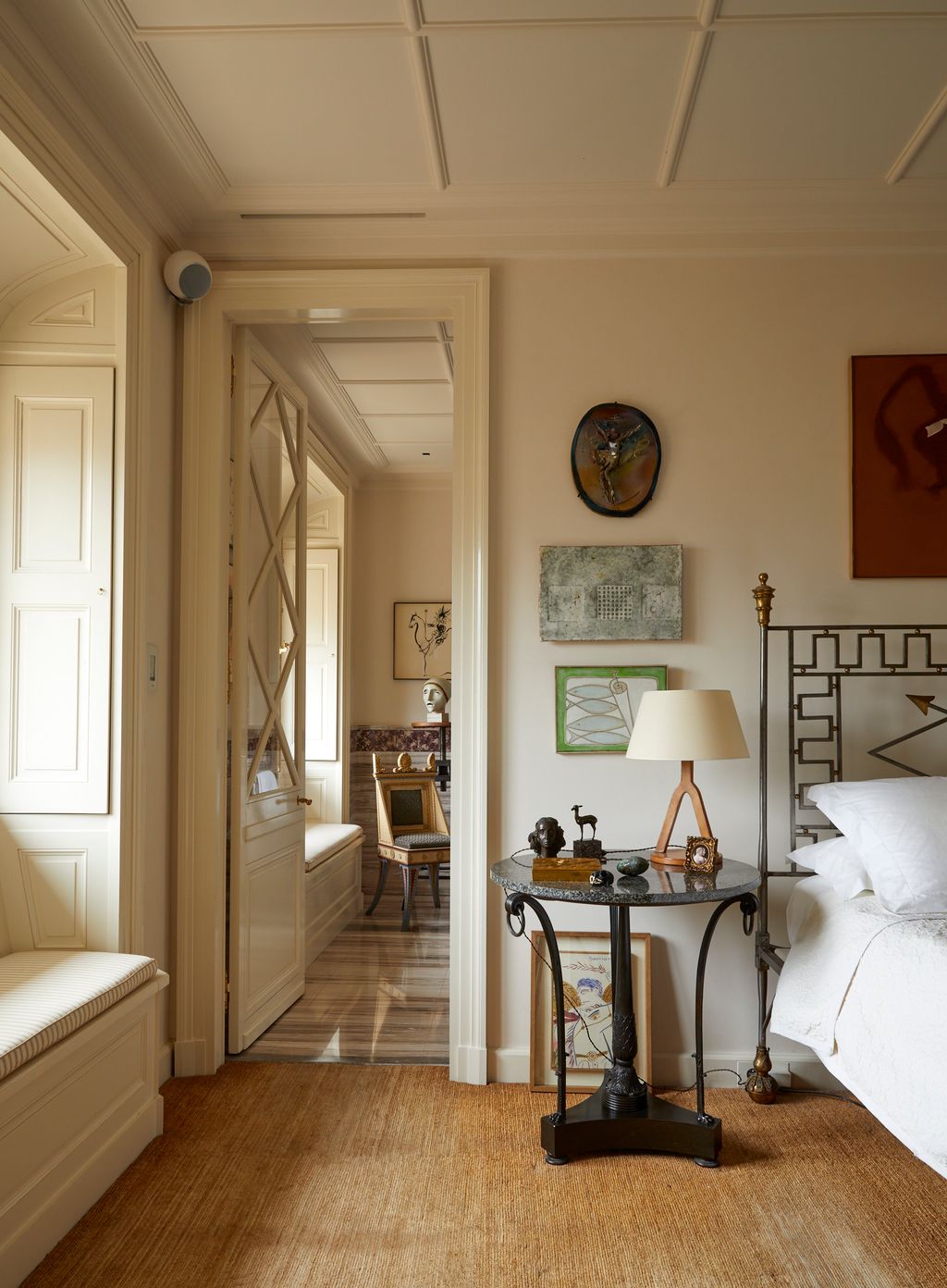 Image may contain Lamp Indoors Interior Design Desk Furniture Table Chair Bed Art Painting Wood and Floor