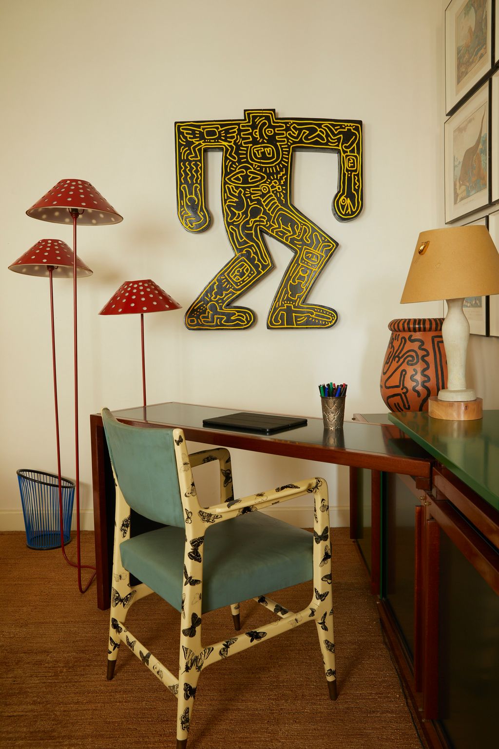 Image may contain Furniture Table Lamp Chair Desk Indoors Interior Design Table Lamp Cup Art and Painting