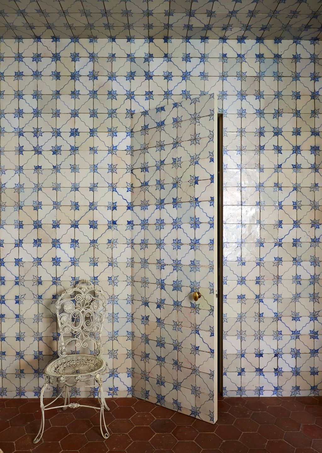 Image may contain Floor Tile Indoors Interior Design Flooring Chair Furniture Architecture Building and Wall