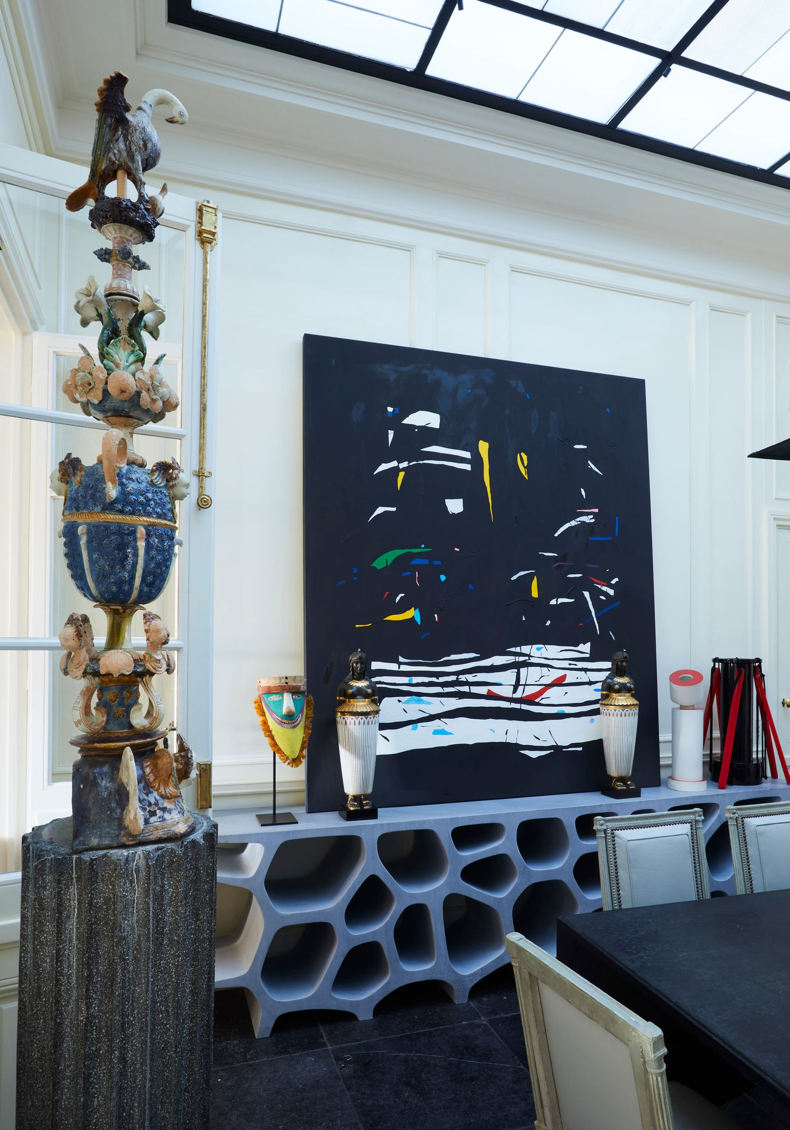 Image may contain Indoors Interior Design Animal Bird Chicken Fowl Poultry Desk Furniture Table Window and Chair