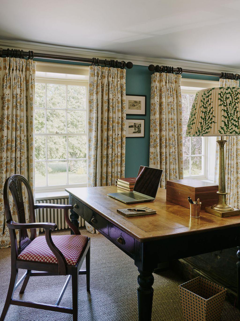 Image may contain Lamp Book Publication Furniture Table Chair Desk Cup Art Painting Computer and Electronics