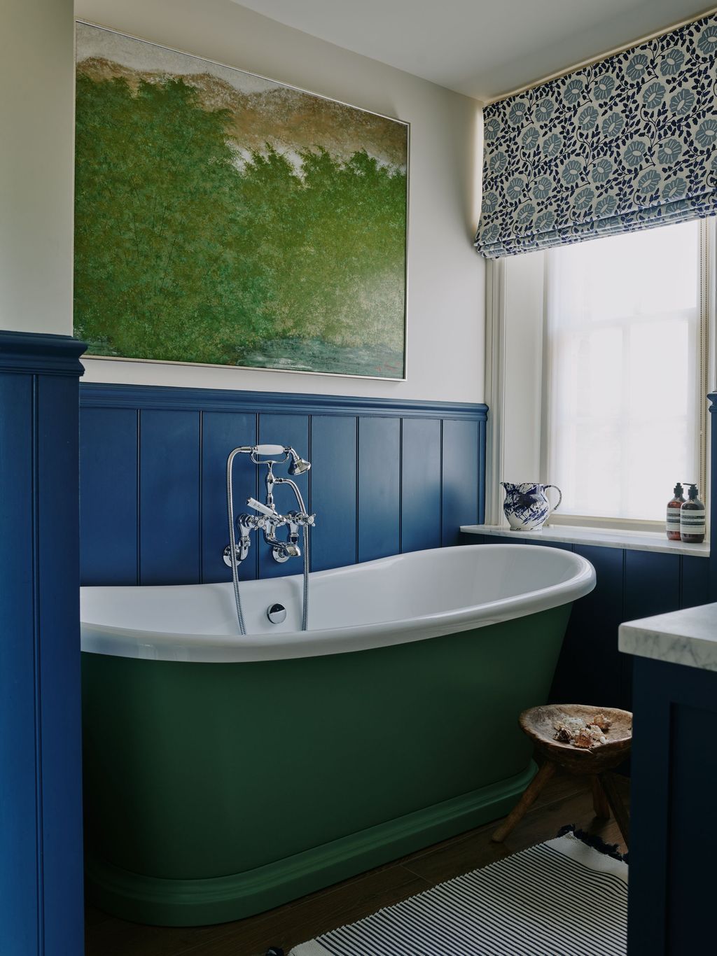 Image may contain Bathing Tub Bathtub Person Indoors Interior Design Home Decor and Rug