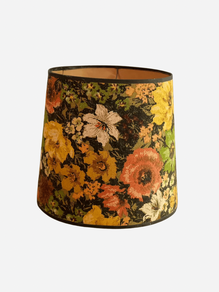 Image may contain: Lamp, Lampshade, and Cup