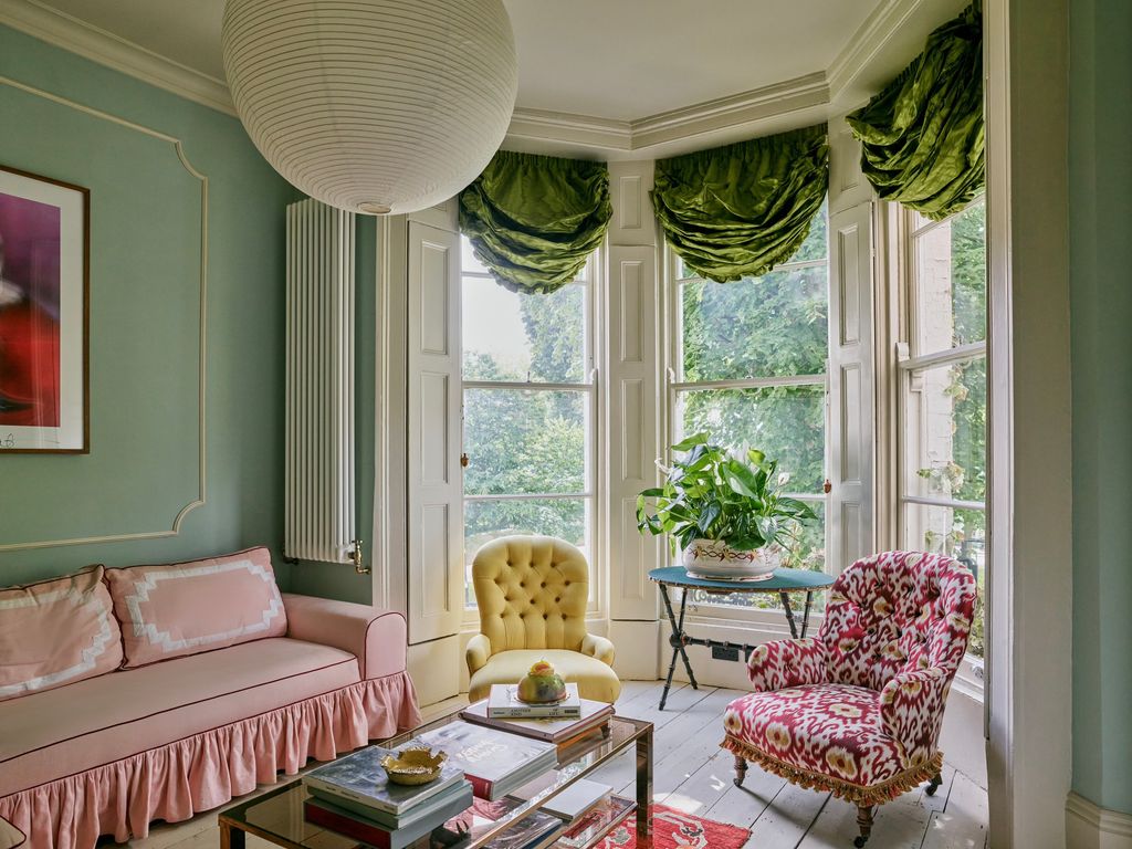 Image may contain Window Art Painting Plant Chair Furniture Couch Desk Table French Window and Bay Window