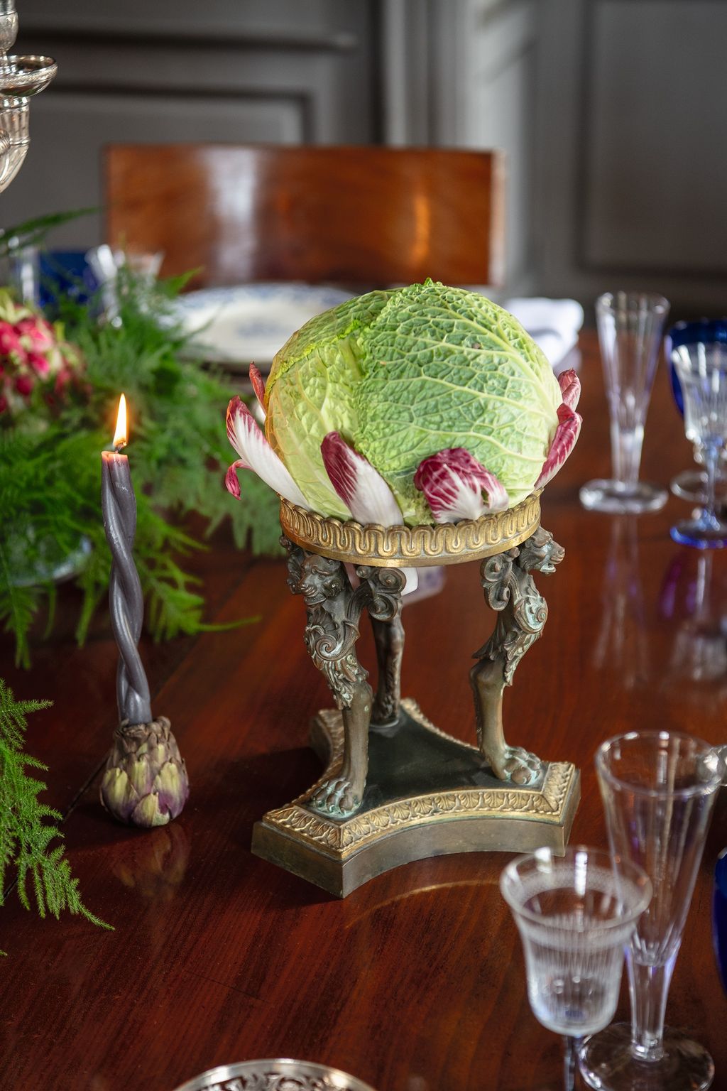 Image may contain Glass Goblet Chair Furniture Table Tabletop Cream Dessert Food Ice Cream Candle and Plate