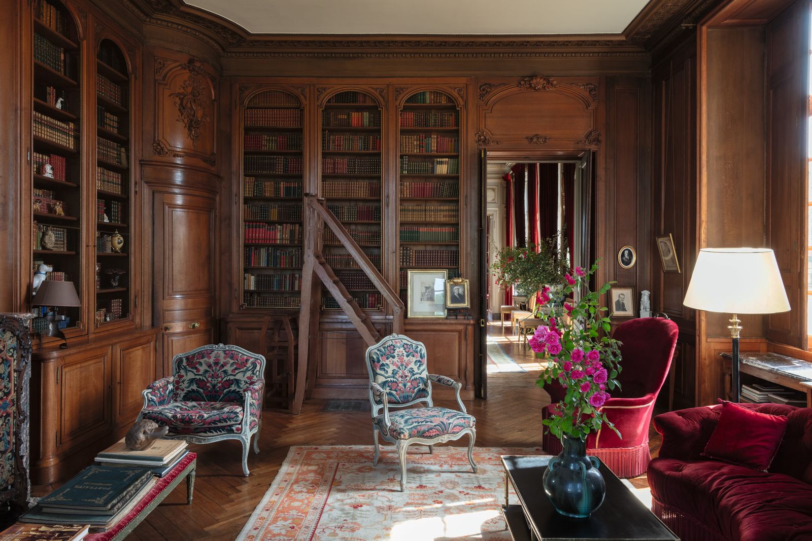 Image may contain Architecture Building Furniture Indoors Living Room Room Interior Design Chair and Home Decor