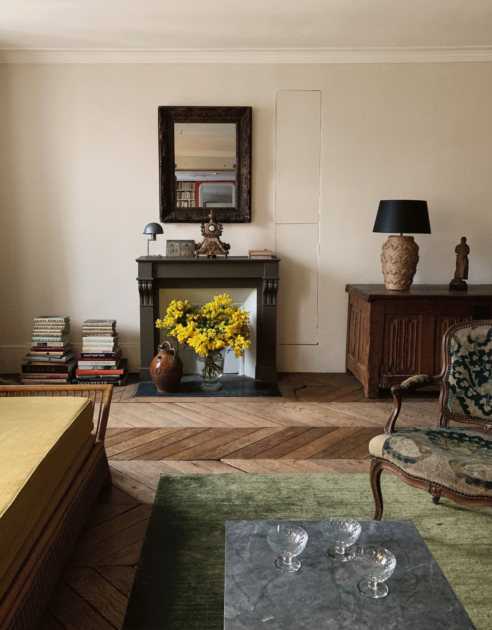 Image may contain Lamp Chair Furniture Indoors Interior Design Home Decor Table Person Floor and Table Lamp