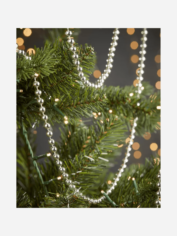 Image may contain: Plant, Tree, Christmas, Christmas Decorations, Festival, Christmas Tree, and Accessories