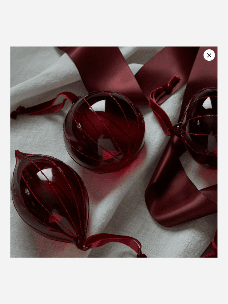 Image may contain: Maroon, Accessories, Ball, Cricket, Cricket Ball, Sport, Formal Wear, and Tie