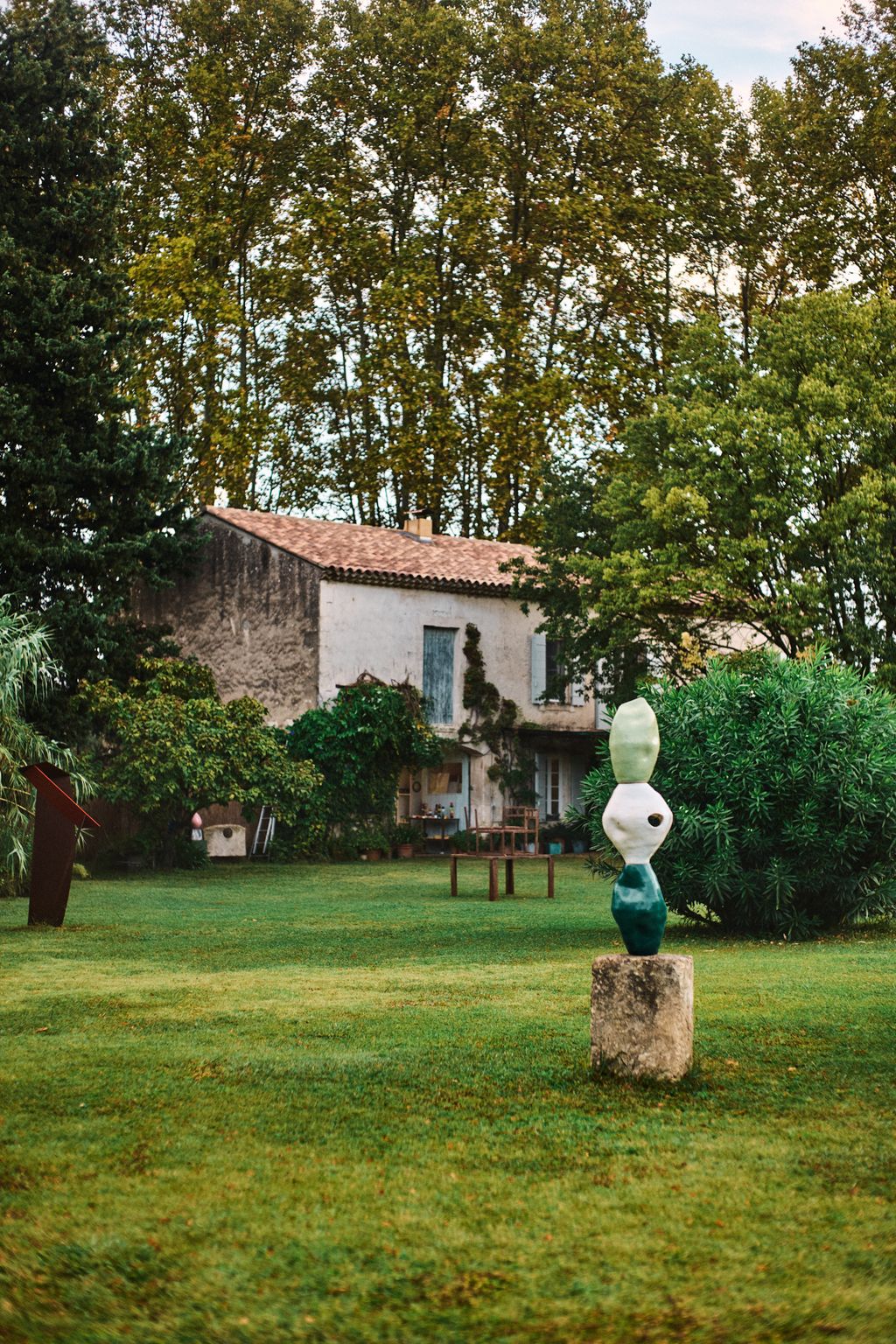 Image may contain Architecture Building Grass Outdoors Plant Shelter House Housing Villa Nature Park and Tree
