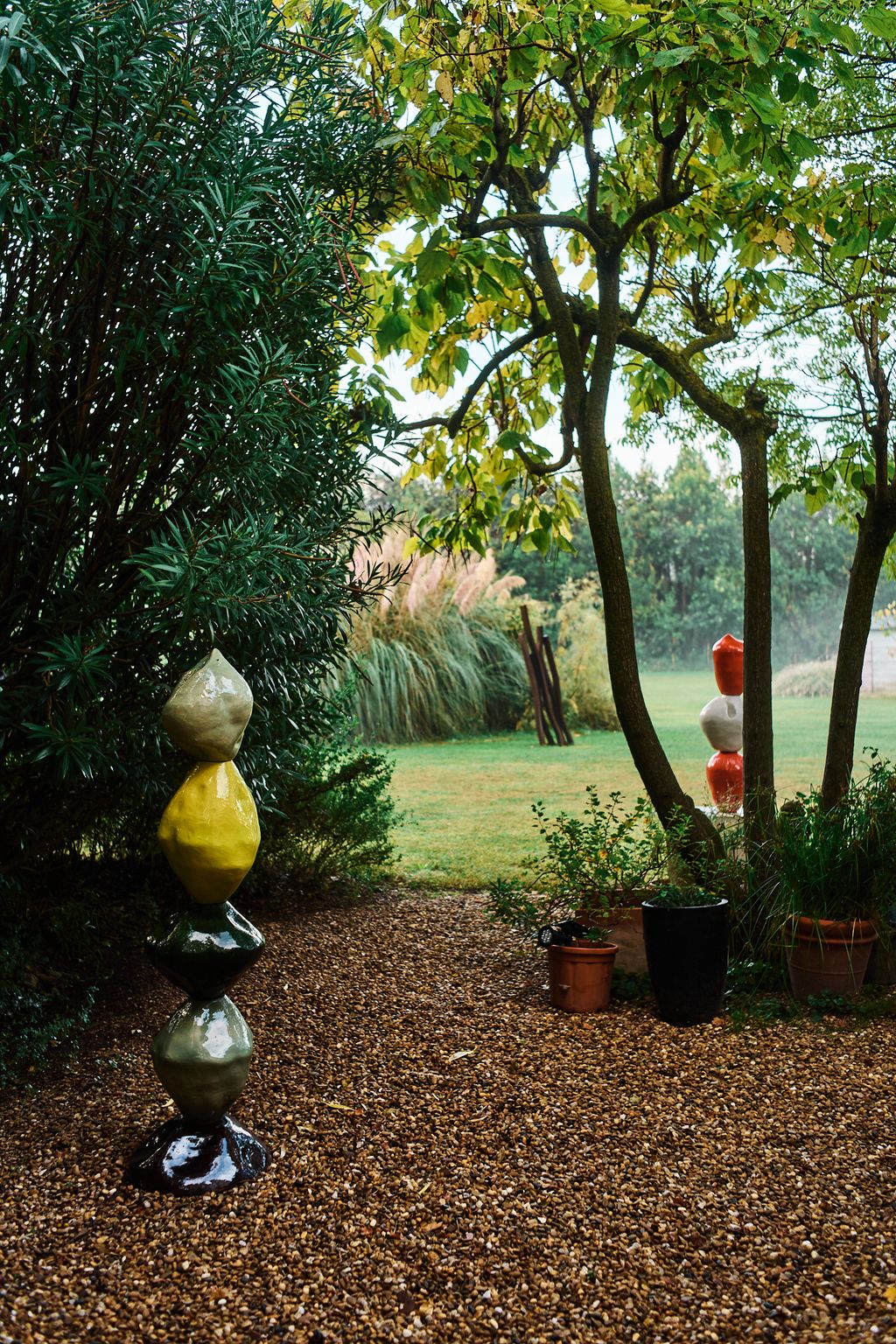 Image may contain Plant Potted Plant Grass Vegetation Jar Planter Pottery Vase Tree Nature Outdoors and Park