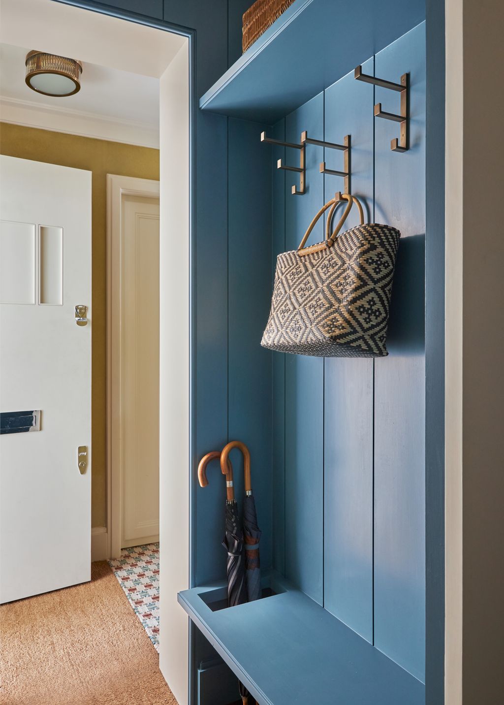 Image may contain Indoors Interior Design Lamp Accessories Bag Handbag Home Decor Rug and Furniture