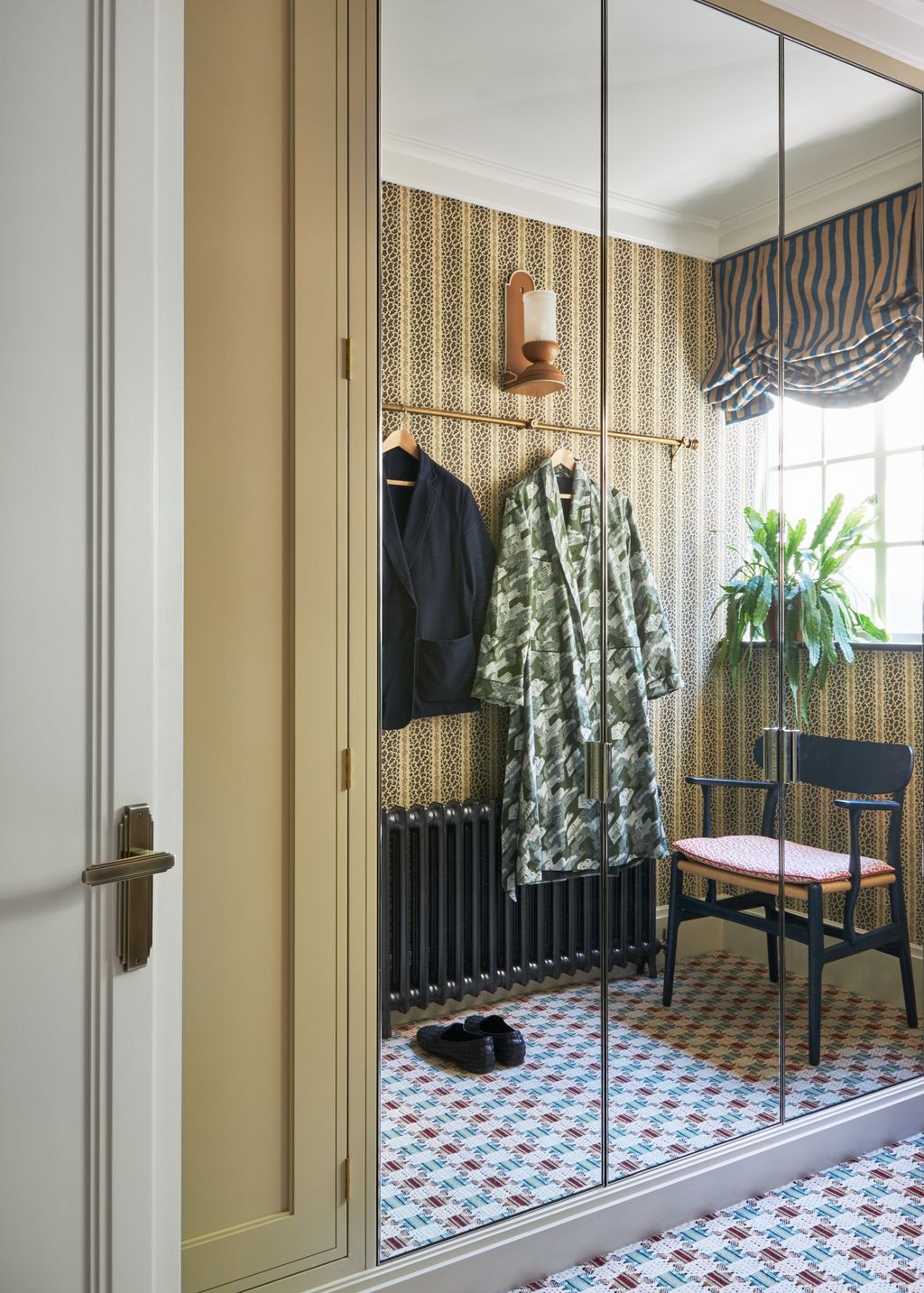 Image may contain Chair Furniture Indoors Interior Design Plant Clothing Footwear Shoe Home Decor and Candle