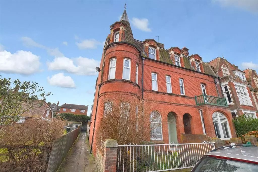 Image may contain Architecture Building Housing House Car Transportation Vehicle Row House and Manor