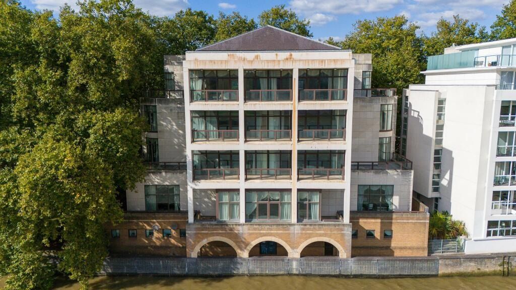 Image may contain City Architecture Building Condo Housing Nature Outdoors Scenery and Office Building