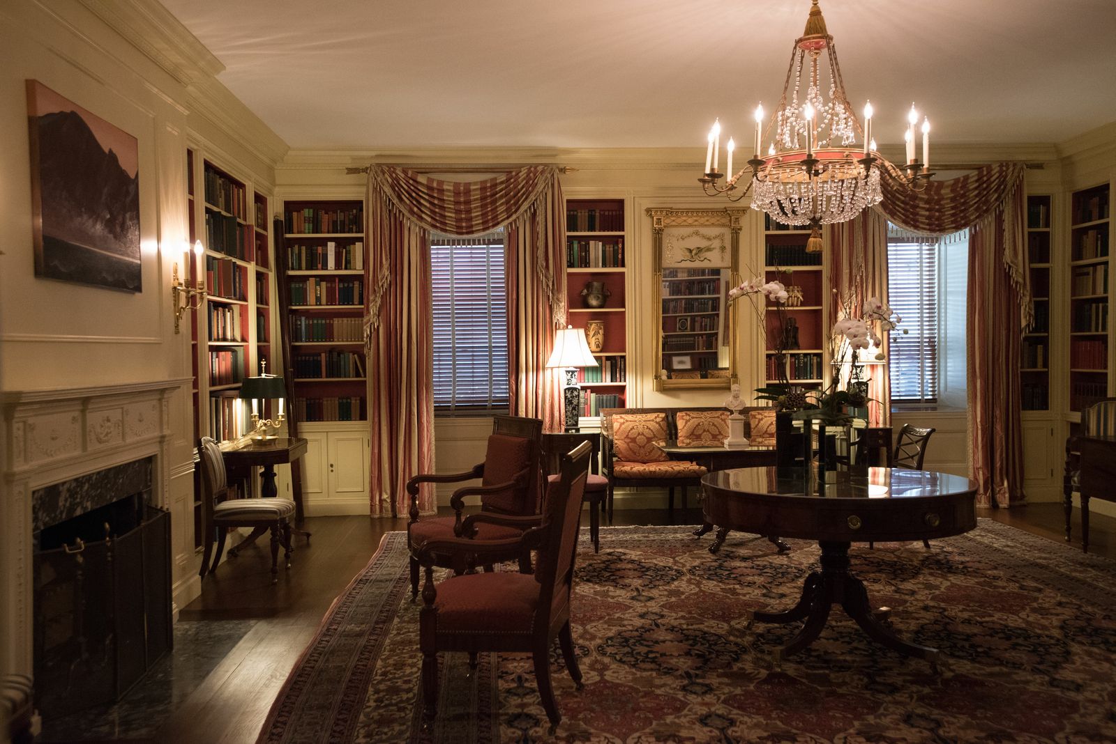 Image may contain Chandelier Lamp Architecture Building Dining Room Dining Table Furniture Indoors Room and Table