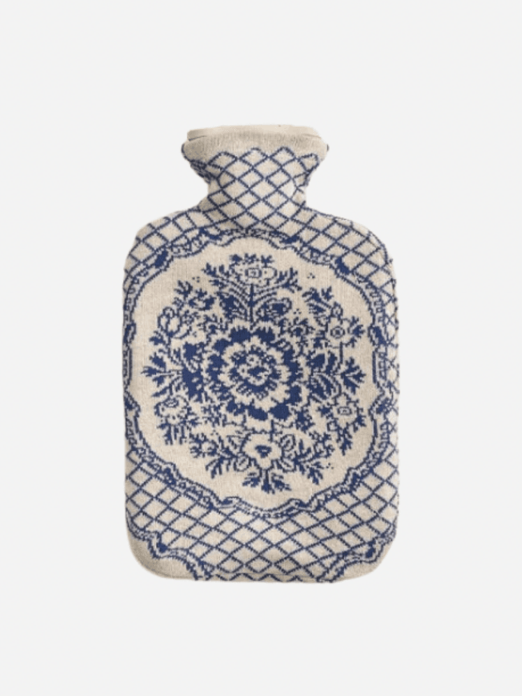 Image may contain: Art, Porcelain, Pottery, Jar, Vase, Clothing, and Coat