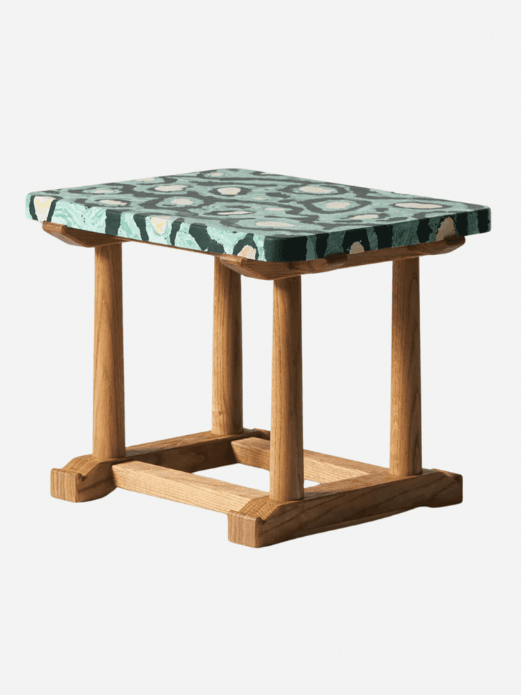 Image may contain: Furniture, Table, Coffee Table, and Bar Stool